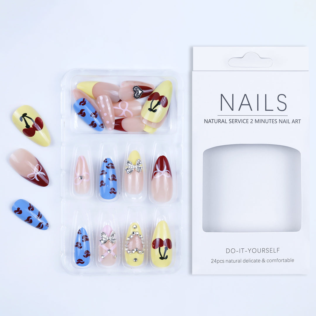 Artificial nails with playful design and 3D embellishments Stornfield