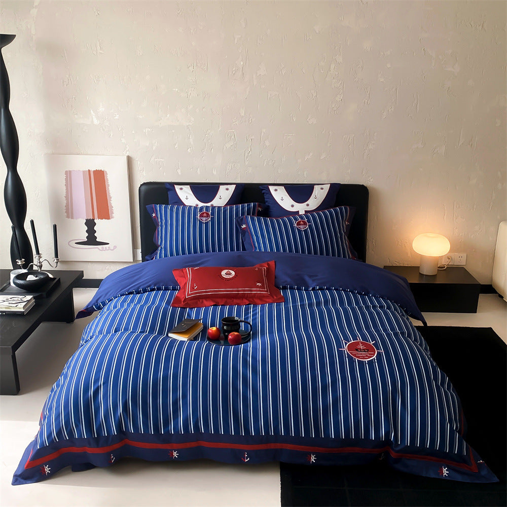 Maritime cotton satin bedding set with fine stripes, nautical embroidery, and reversible pillow