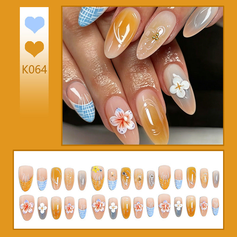 Acrylic nail set with aesthetic floral accents and gloss finish Stornfield
