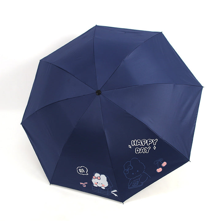 Ladies folding umbrella with playful design and cheerful Stornfield motif