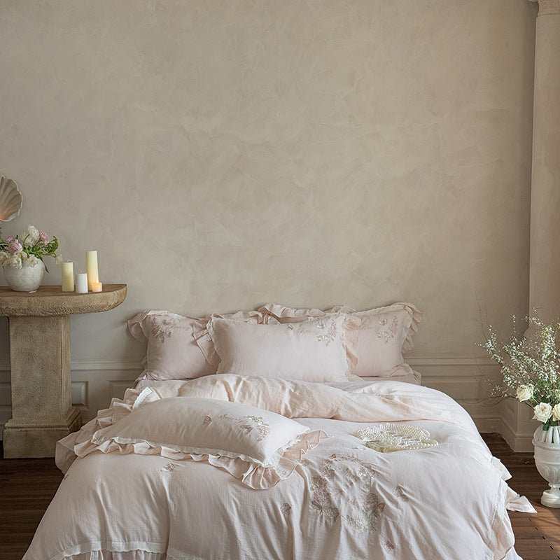 Embroidered cotton muslin bedding set with ruffle and floral watercolor embroidery design Stornfield