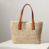 Braided straw bag with sturdy leather handles Stornfield