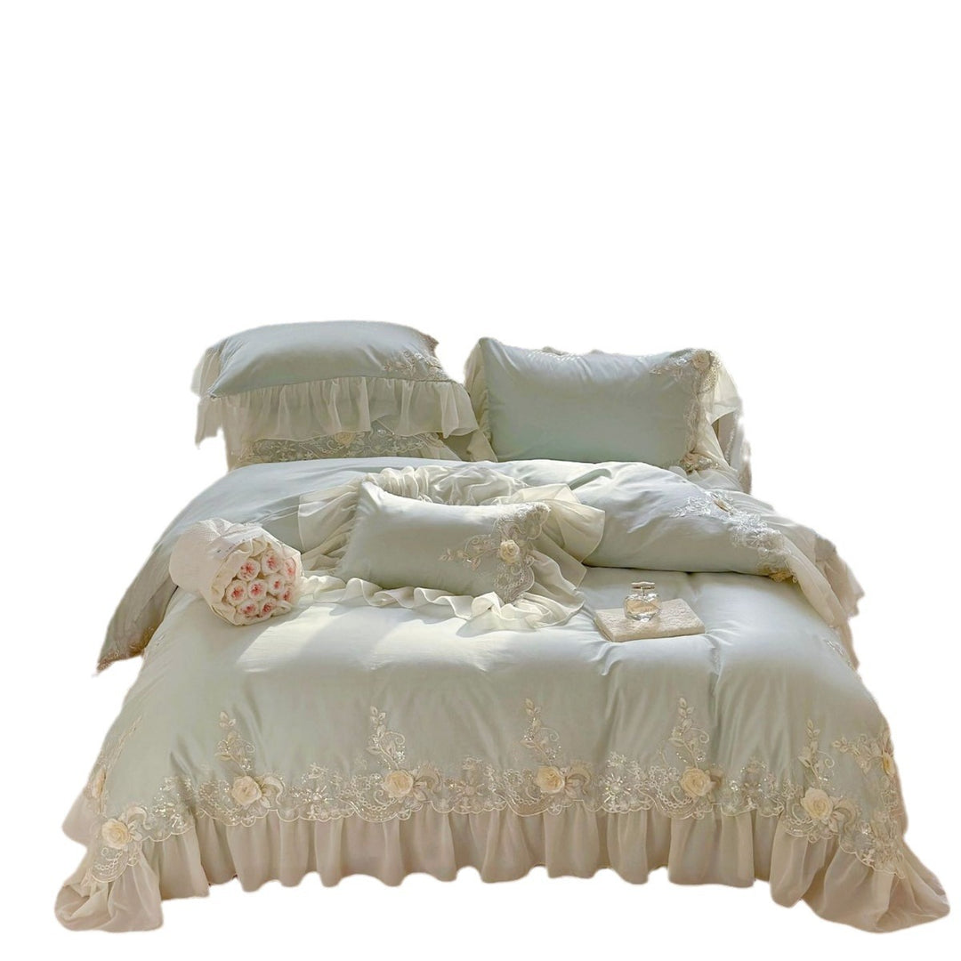 Luxurious embroidered bedding set with ruffles and lace