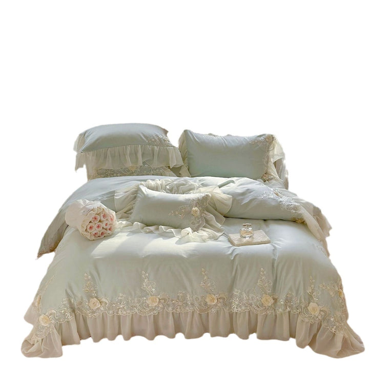 Luxurious embroidered bedding set with ruffles and lace