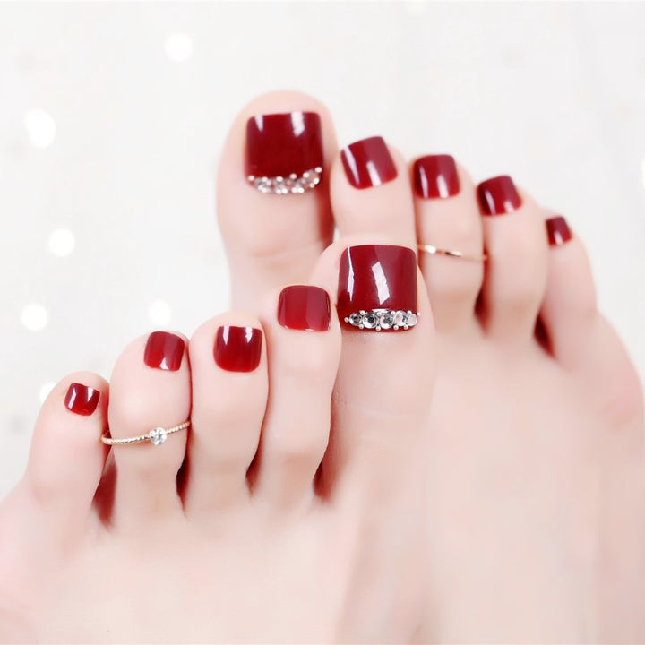 Acrylic nail set with elegant nail art and sparkle elements Stornfield