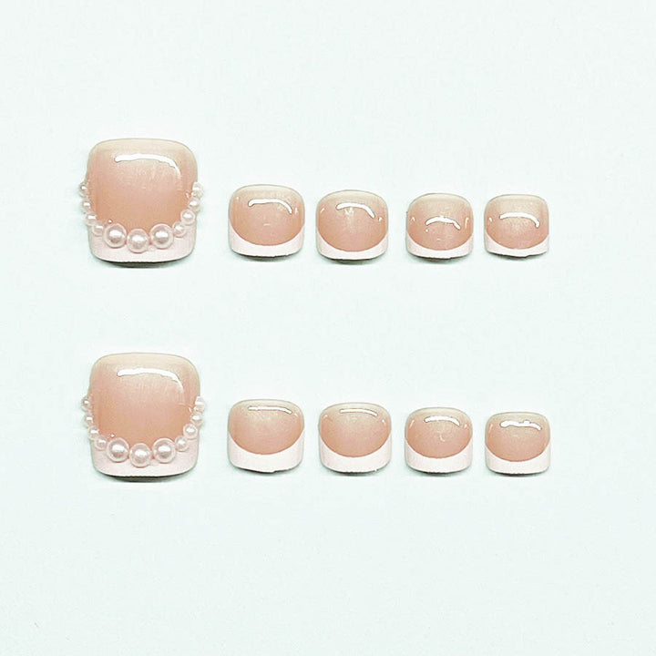 Artificial nail set for toenails with elegant tip decorations Stornfield
