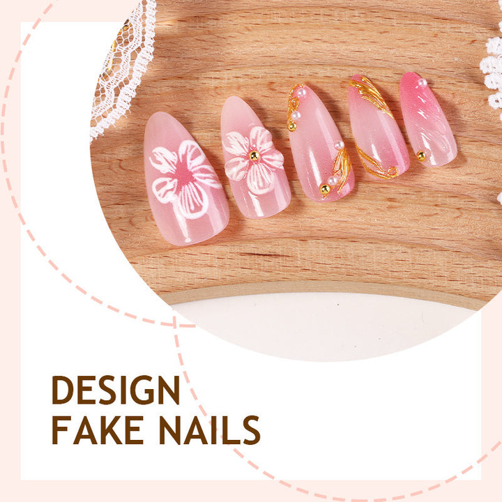 Creative nail art set with floral and golden accents Stornfield