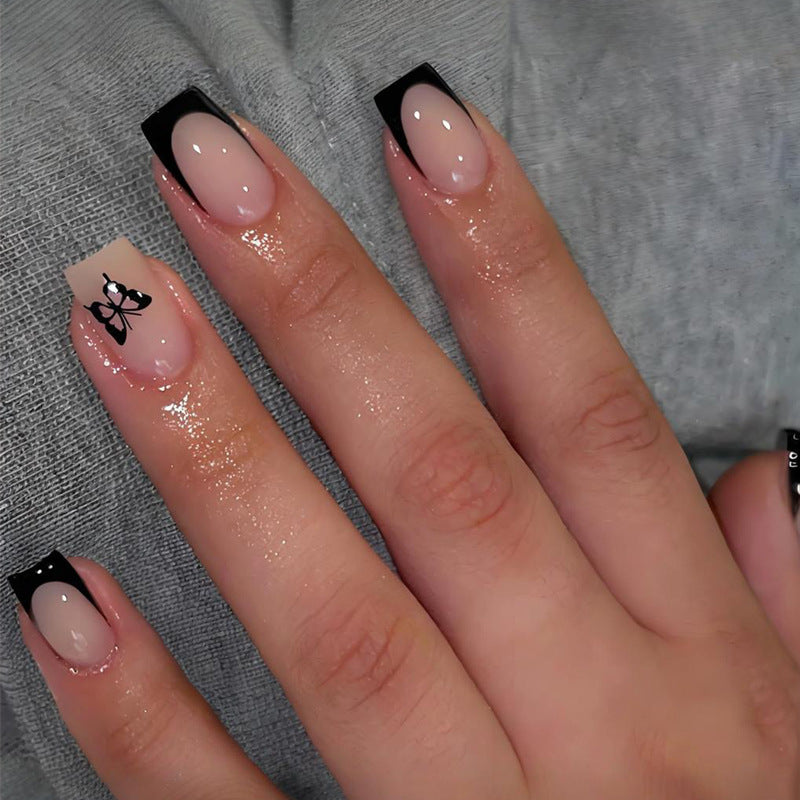 Glamorous artificial nail set with filigree butterfly designs Stornfield