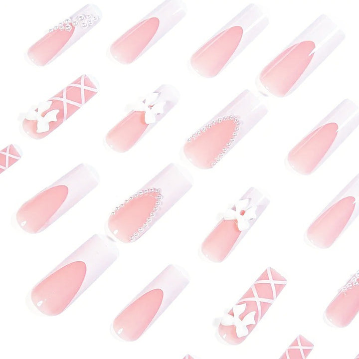 Artificial nail set with elegant 3D bows and pearl embellishments Stornfield
