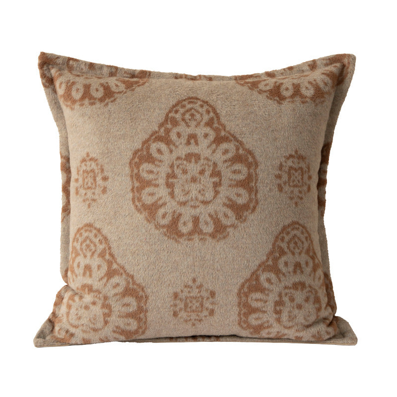 Square decorative sofa cushion with jacquard-woven ornament and soft bouclé surface Stornfield