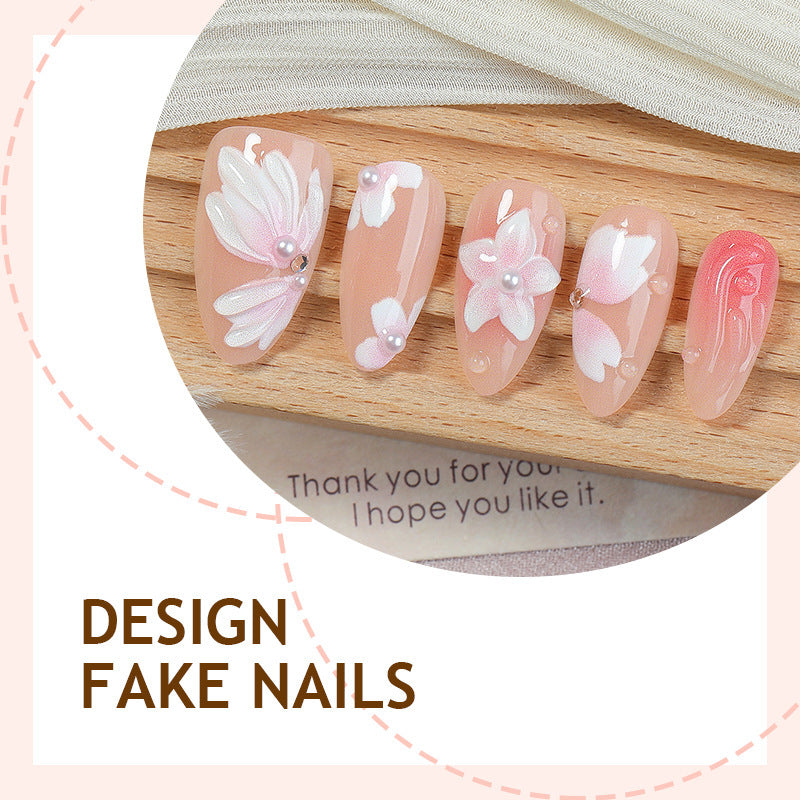 Artificial nail set with floral motifs and rhinestone decorations Stornfield