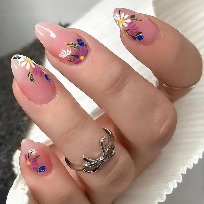 Artificial nail set with floral designs and elegant tips Stornfield