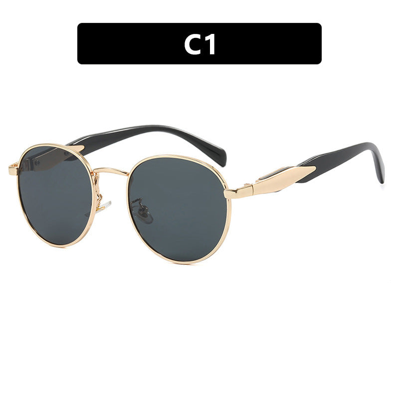 Women's round sunglasses with elegant, golden frame and UV protection Stornfield