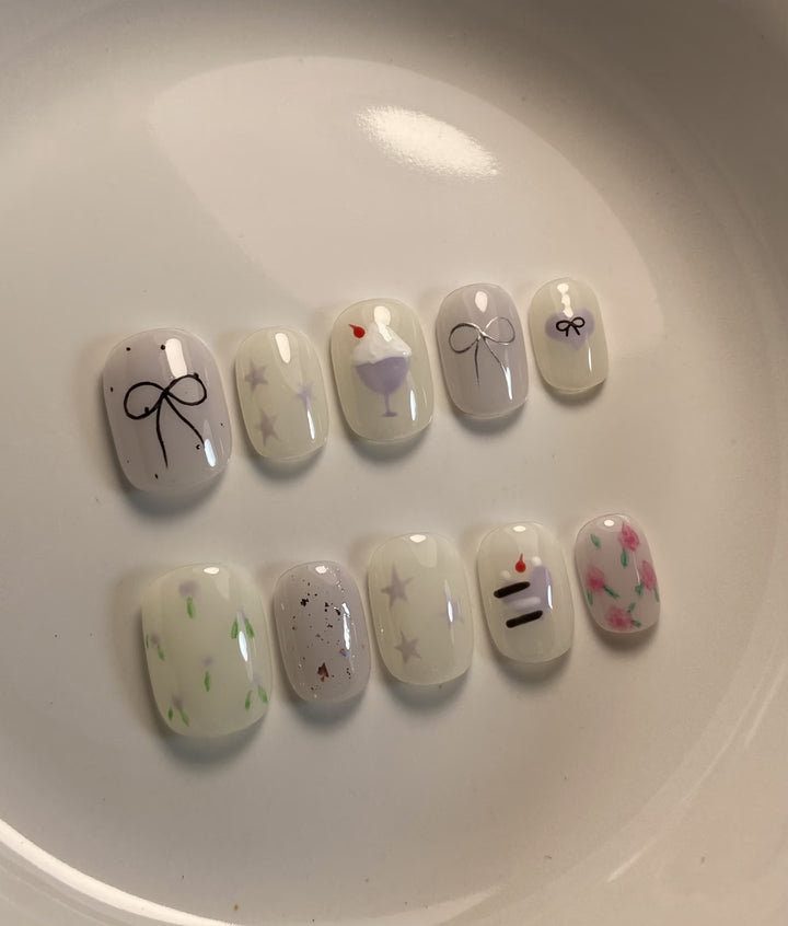 Artistic Press-On Nail Art Set with Cute Cake and Ribbon Designs