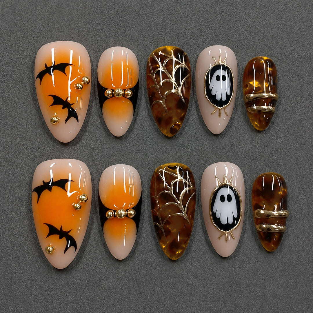 Halloween Artificial Nail Set with spooky designs and golden accents Stornfield