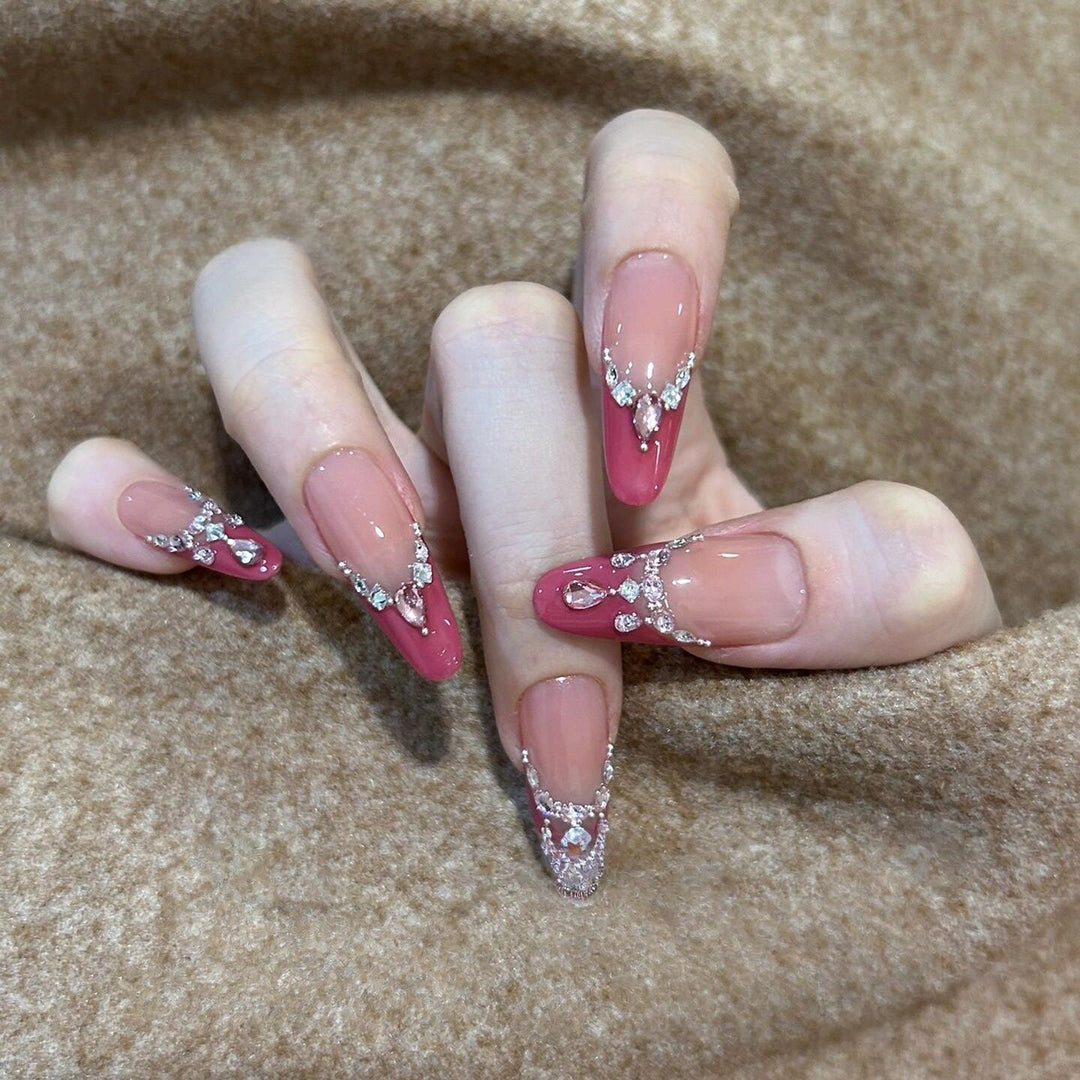 Artificial nails with sparkling rhinestone accents Stornfield