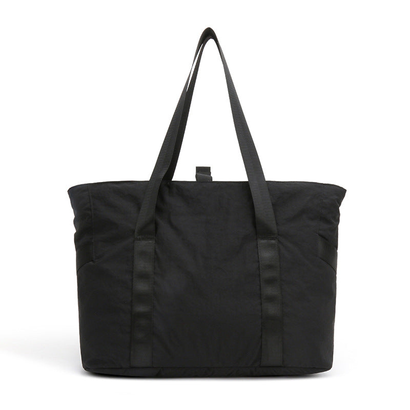 Stylish tote bag with spacious main compartment and reinforced handles Stornfield