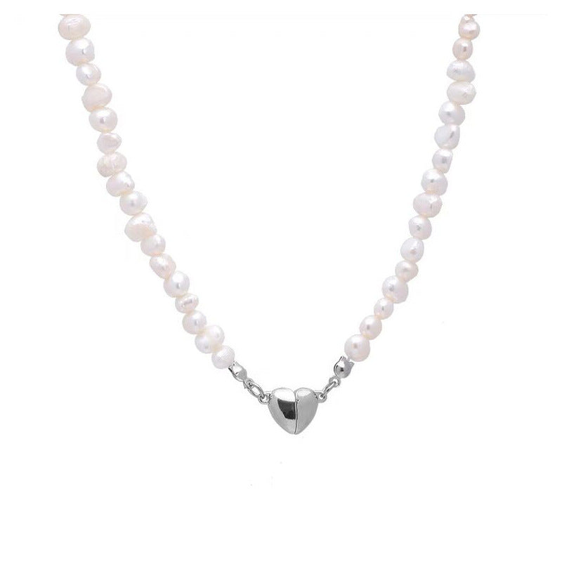 Elegant silver pearl bracelet with heart details Stornfield