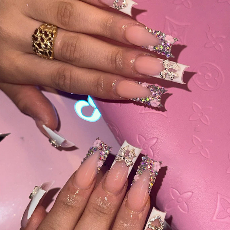 Nail set with glamorous 3D flower embellishments Stornfield