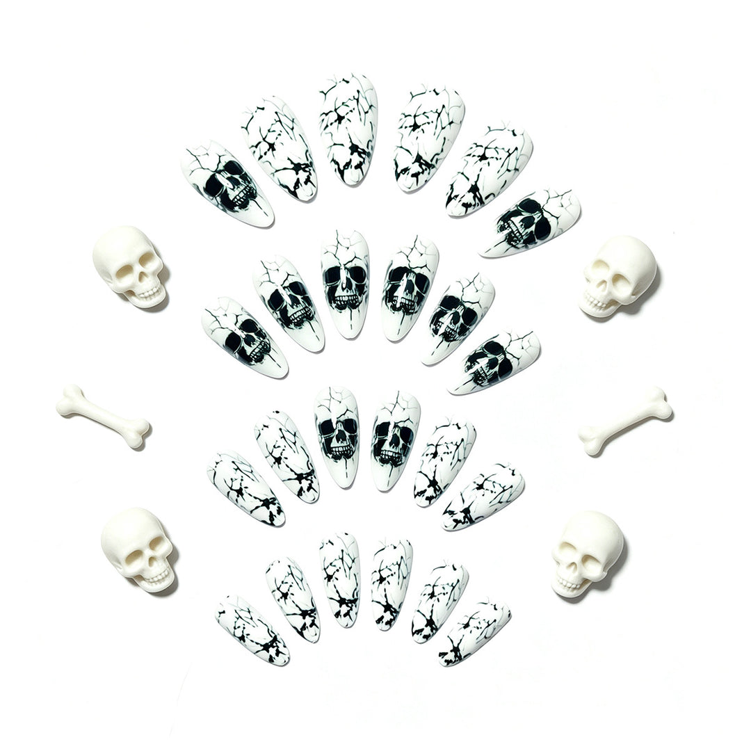 Artificial nails with playful skull design and crackle effects Stornfield
