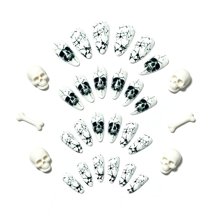 Artificial nails with playful skull design and crackle effects Stornfield