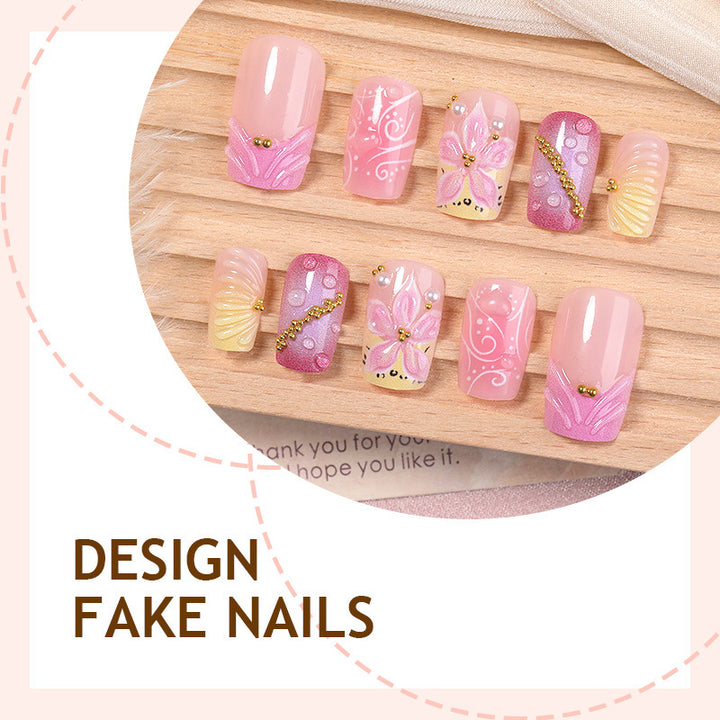 Artificial nail set with floral and glamorous designs Stornfield