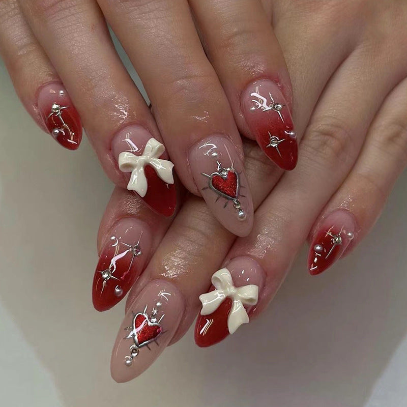 Artistic Heart-Themed Nail Art Extensions Stornfield