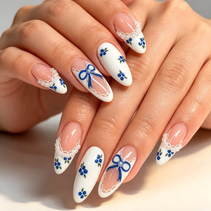 Artificial nails with romantic flower and bow decor Stornfield