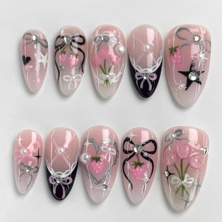 Creative nail art set with elegant bow and glitter designs Stornfield