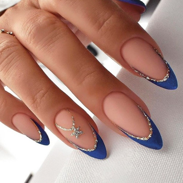 Artificial nail creation with glamorous tips and glitter details Stornfield