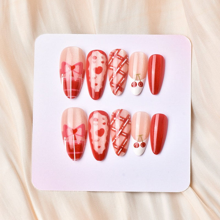 Artificial nail set with playful heart and cherry motifs Stornfield