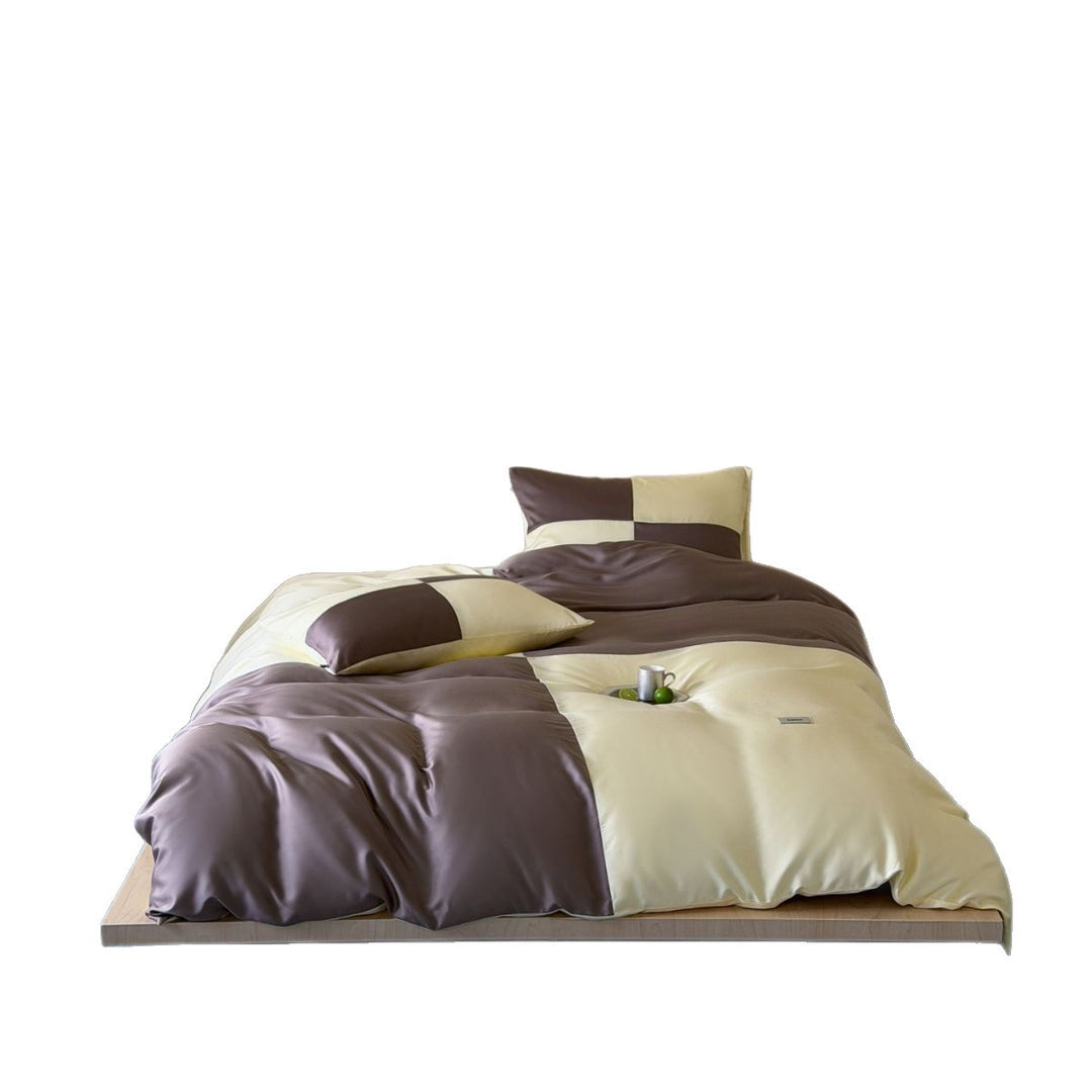 Reversible glossy satin bedding set with contrasting panels and silky touch