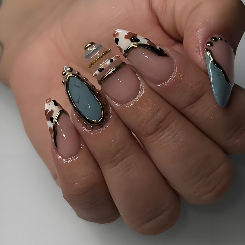 Artificial nail set with luxurious decorative elements and elegant designs Stornfield