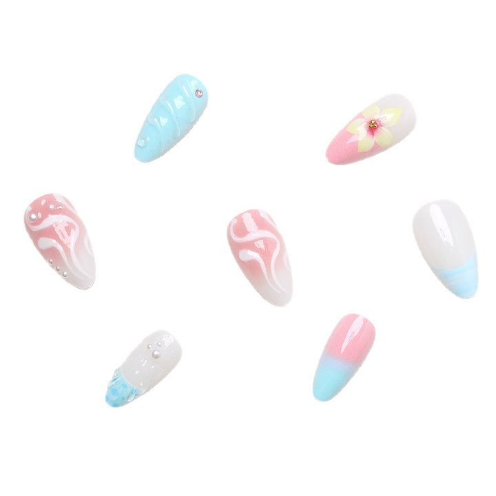 Artificial nail set with floral and shell-shaped designs Stornfield