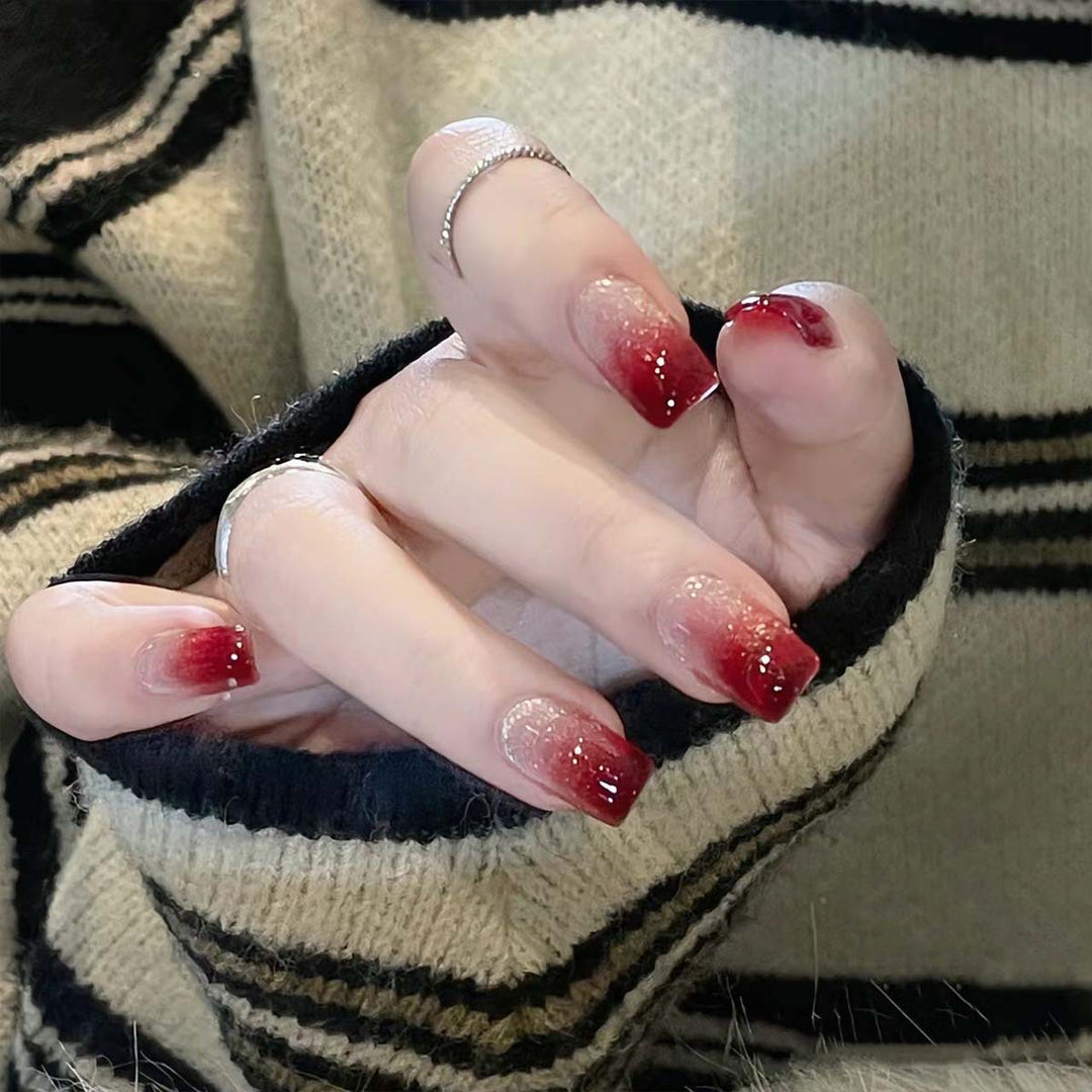 Glamorous artificial nails with glitter gradient Stornfield