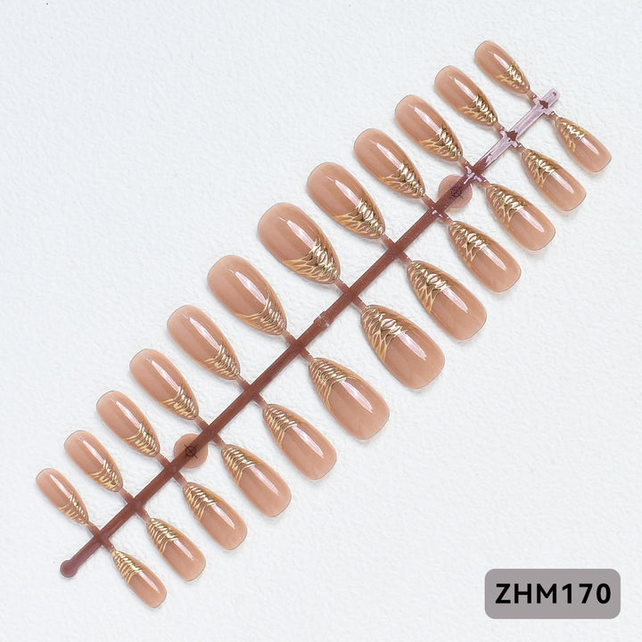 Elegant Press-On Nail Tips with Gold Detailing Stornfield
