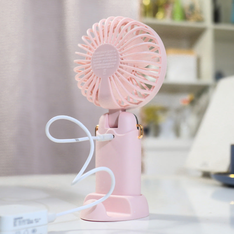 Women's Portable Hand Fan with Integrated Spray Function and USB Charging Option Stornfield