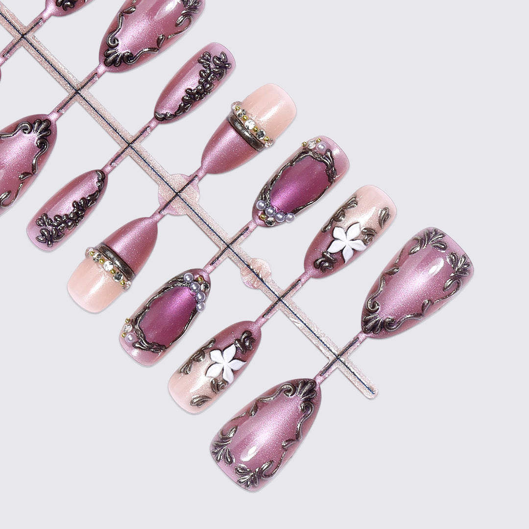 Acrylic nail set with floral design and glamorous accents Stornfield