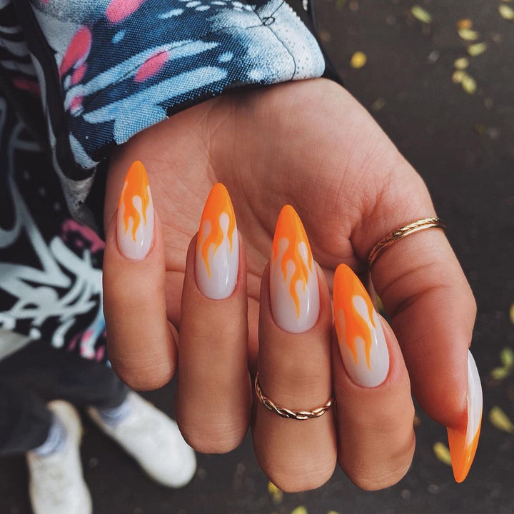 Artful nail extensions with an elegant leaf pattern Stornfield