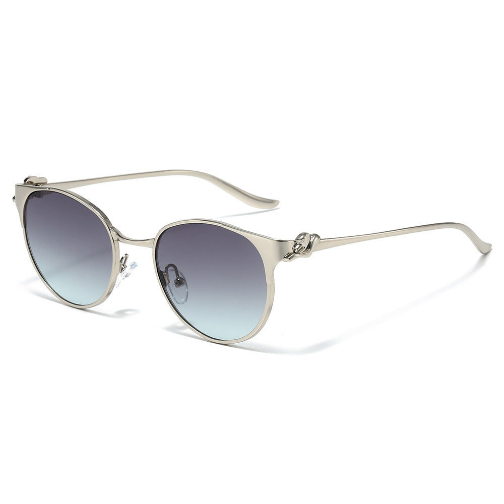 Elegant Cat-Eye Sunglasses with Decorative Gold Accents Stornfield
