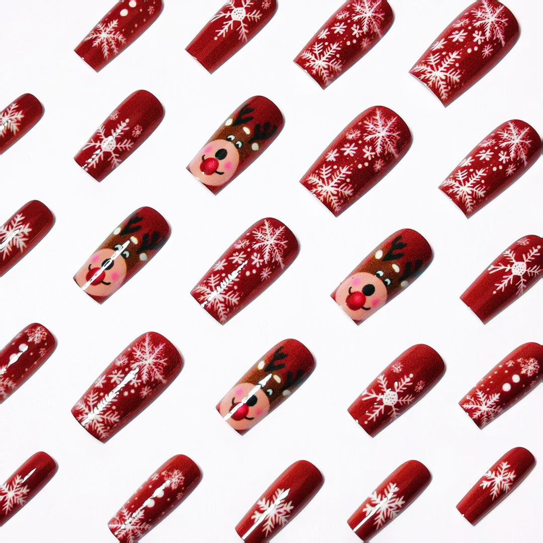 Artificial nails with festive reindeer and snowflake design Stornfield