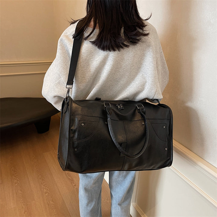 Elegant leather bag with stylish design and versatile carrying options Stornfield