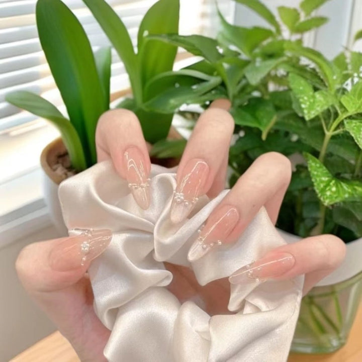 Decorative Acrylic Nail Extensions with Pearlescent Accents