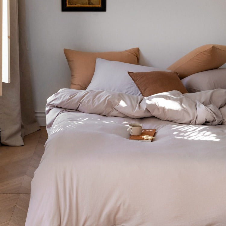 Minimalistic duvet cover set made of skin-friendly cotton blend with soft fiber filling