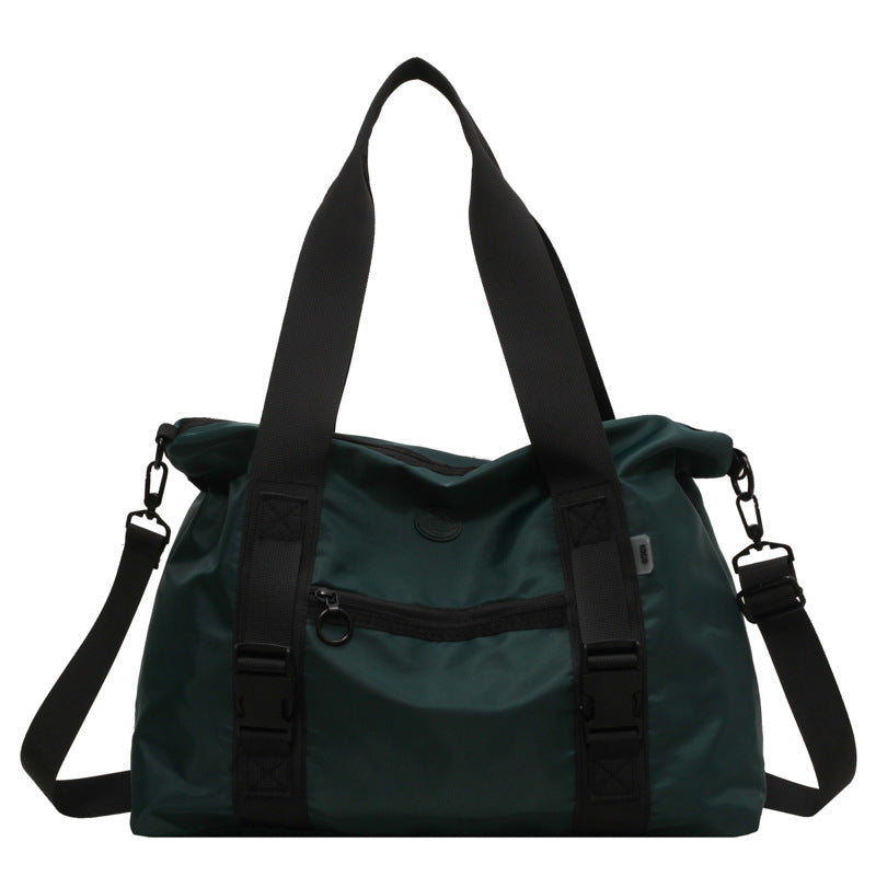 Spacious sports duffel bag with ergonomic carrying handles and water-repellent material Stornfield