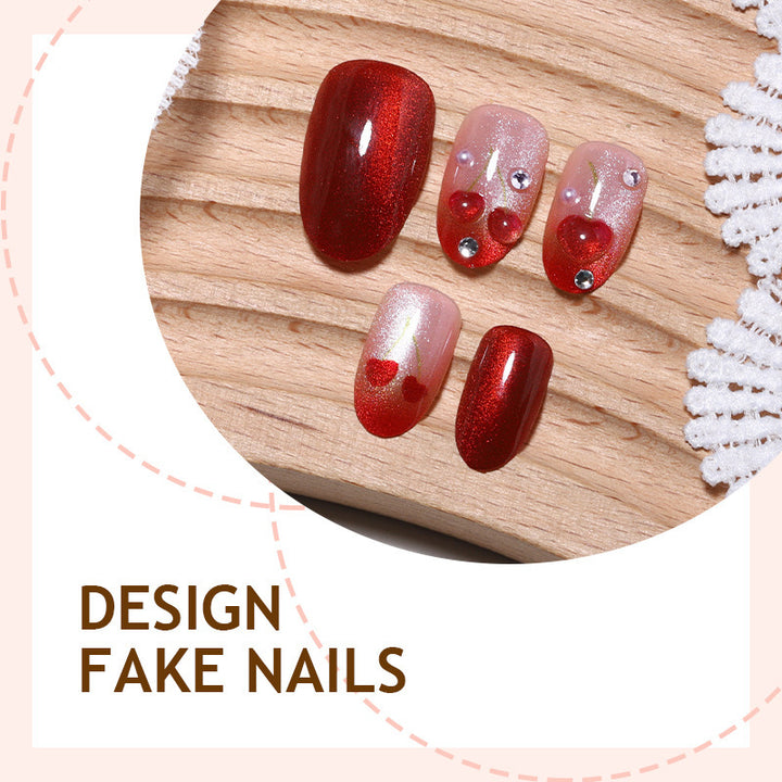 Artificial nail set with glamorous accents and creative heart motifs Stornfield