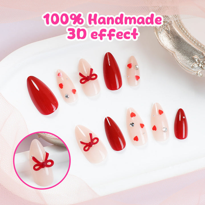 Artificial nail set with festive heart and bow accents Stornfield