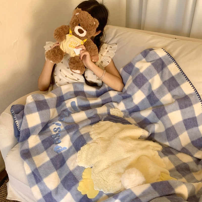 Cuddle blanket with teddy applique and checkered fleece