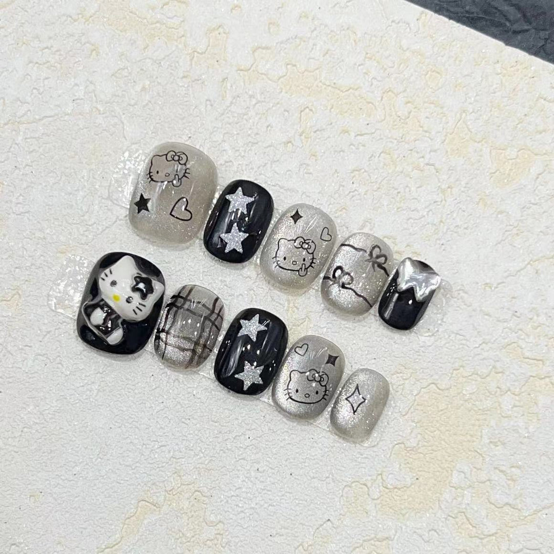 Fun and Whimsical Press-On Nail Set with Cartoon Accents Stornfield