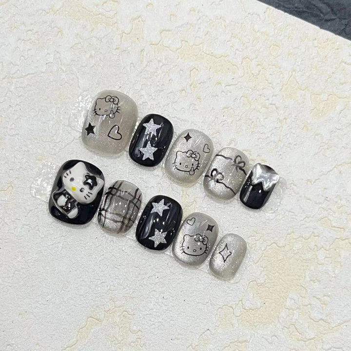 Fun and Whimsical Press-On Nail Set with Cartoon Accents Stornfield